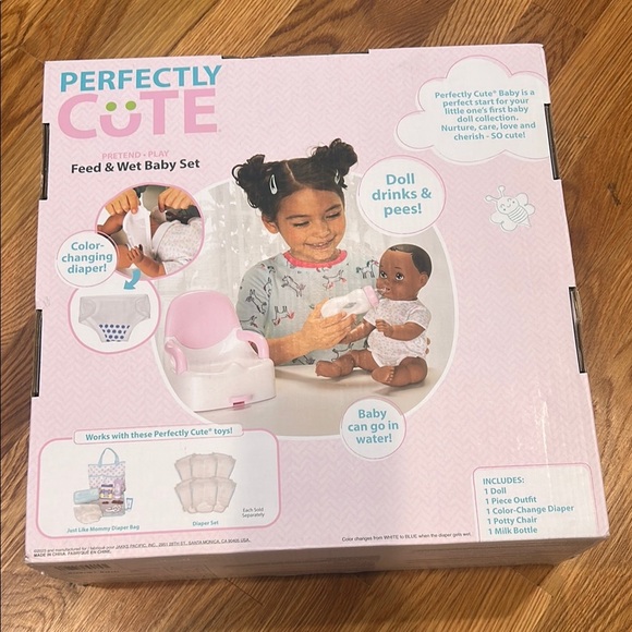 Perfectly Cute Brown Baby Doll Set with bottle toilet & color change diaper new - Picture 2 of 6